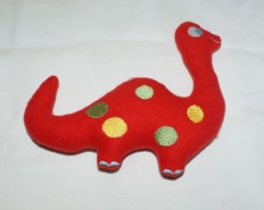 Doudou dinosaure rouge